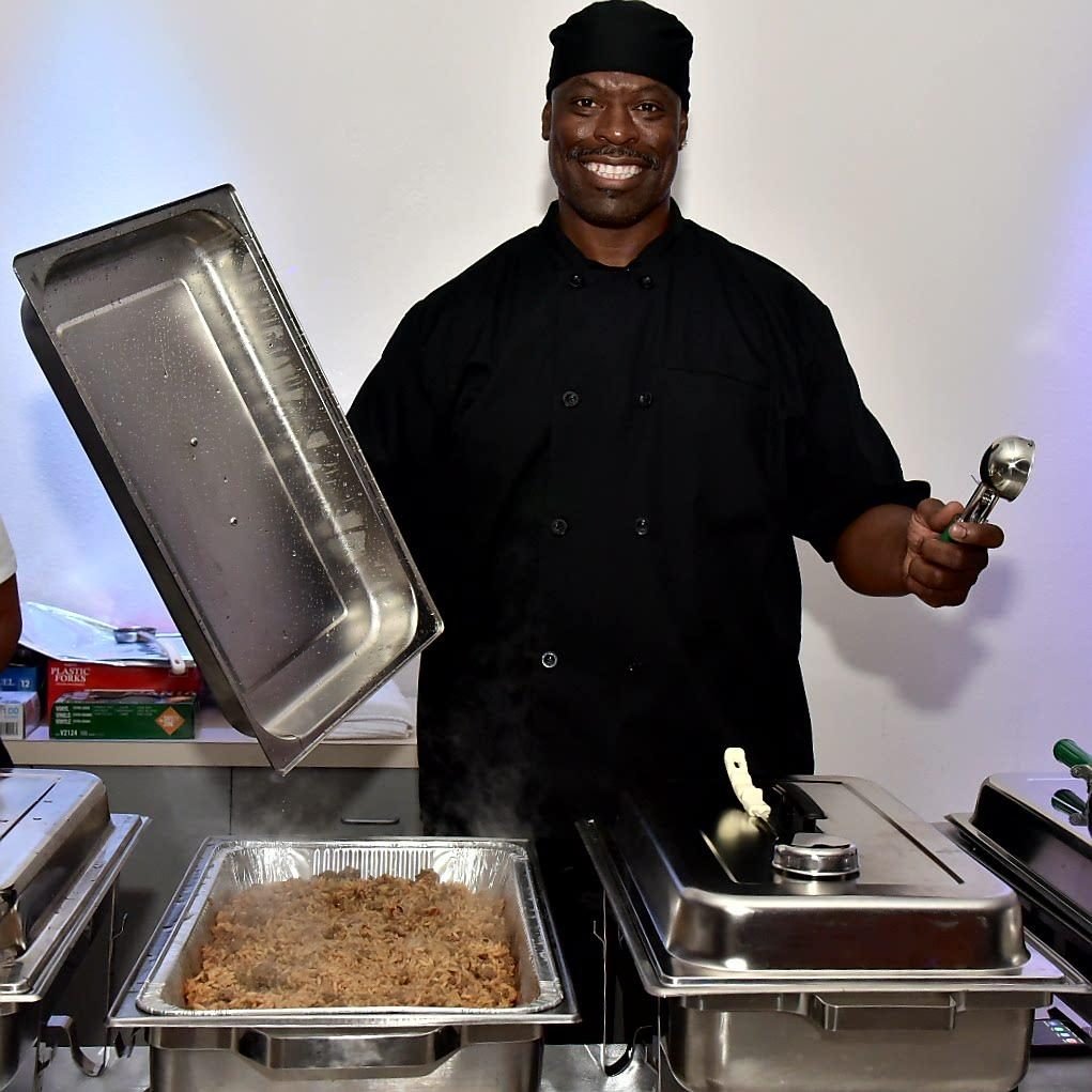 The pitmaster serving up a plate